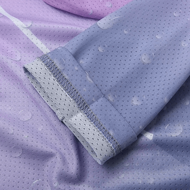 Close-up of the purple sleeve detail on a women's ice silk top, featuring a breathable, lightweight design with a textured finish.